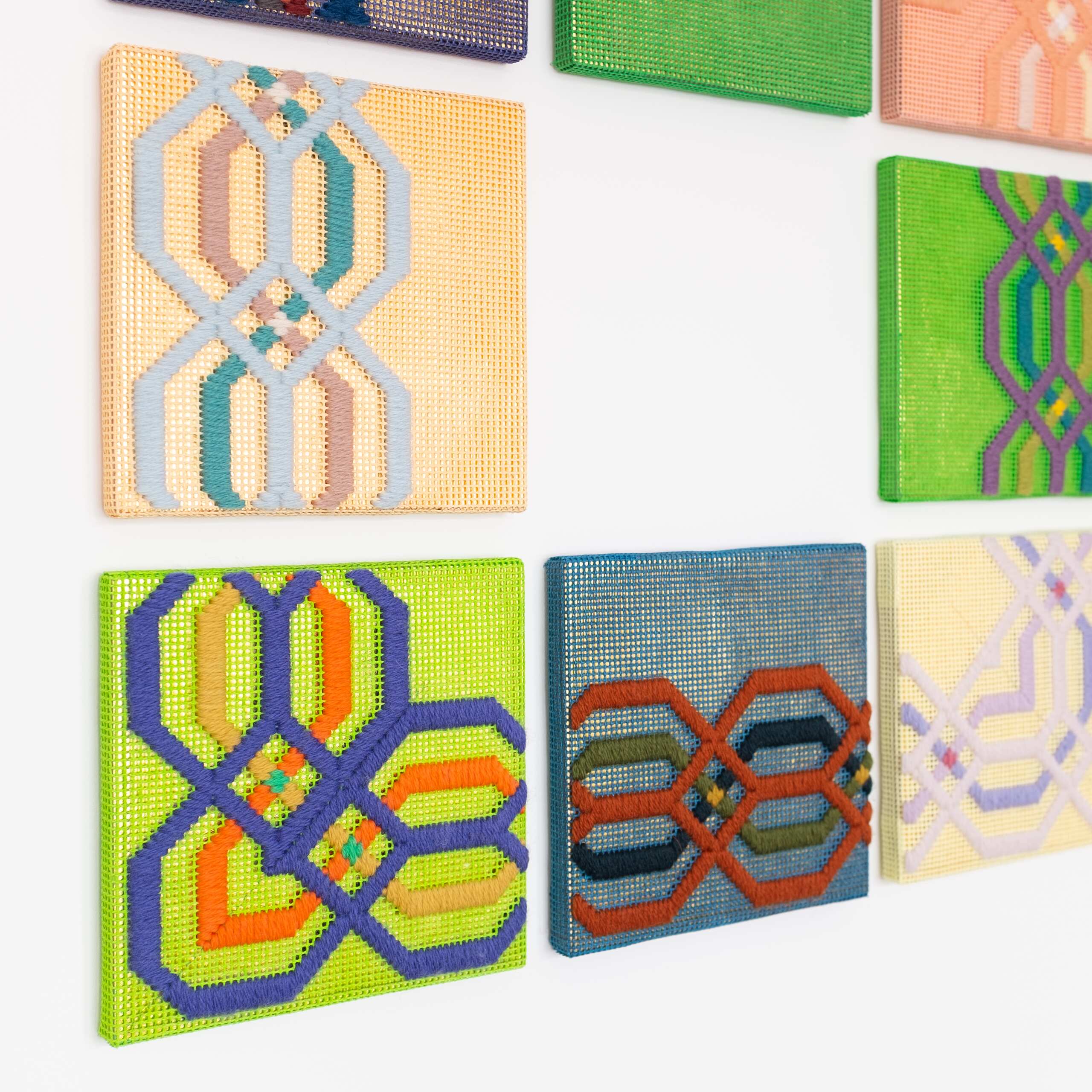 Border fragments [assembly], Hand-embroidered wool thread and acrylic paint on canvas over gilded panel, 2021