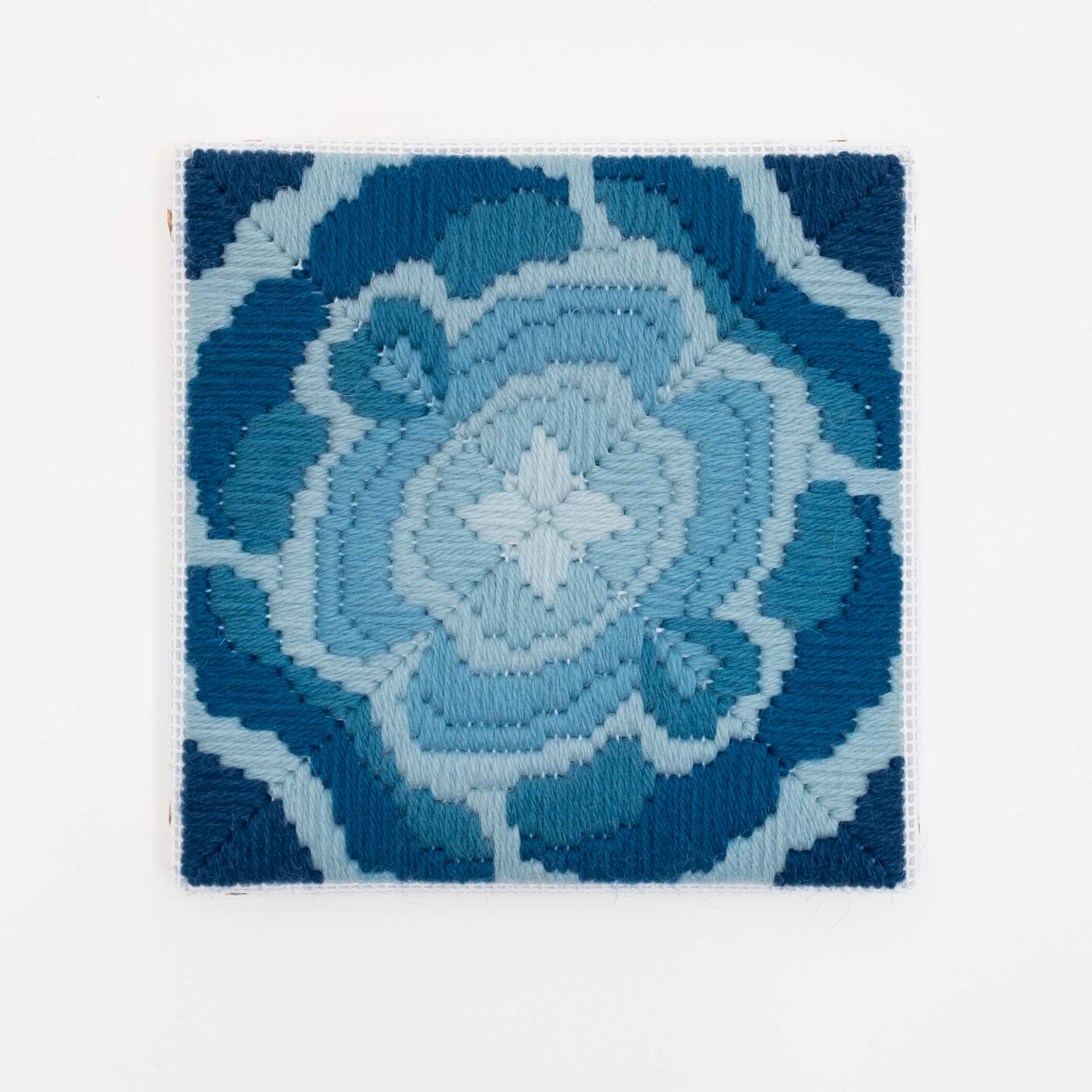 Depression Era [cast glass, azure], Hand-embroidered wool on canvas over panel, 2020