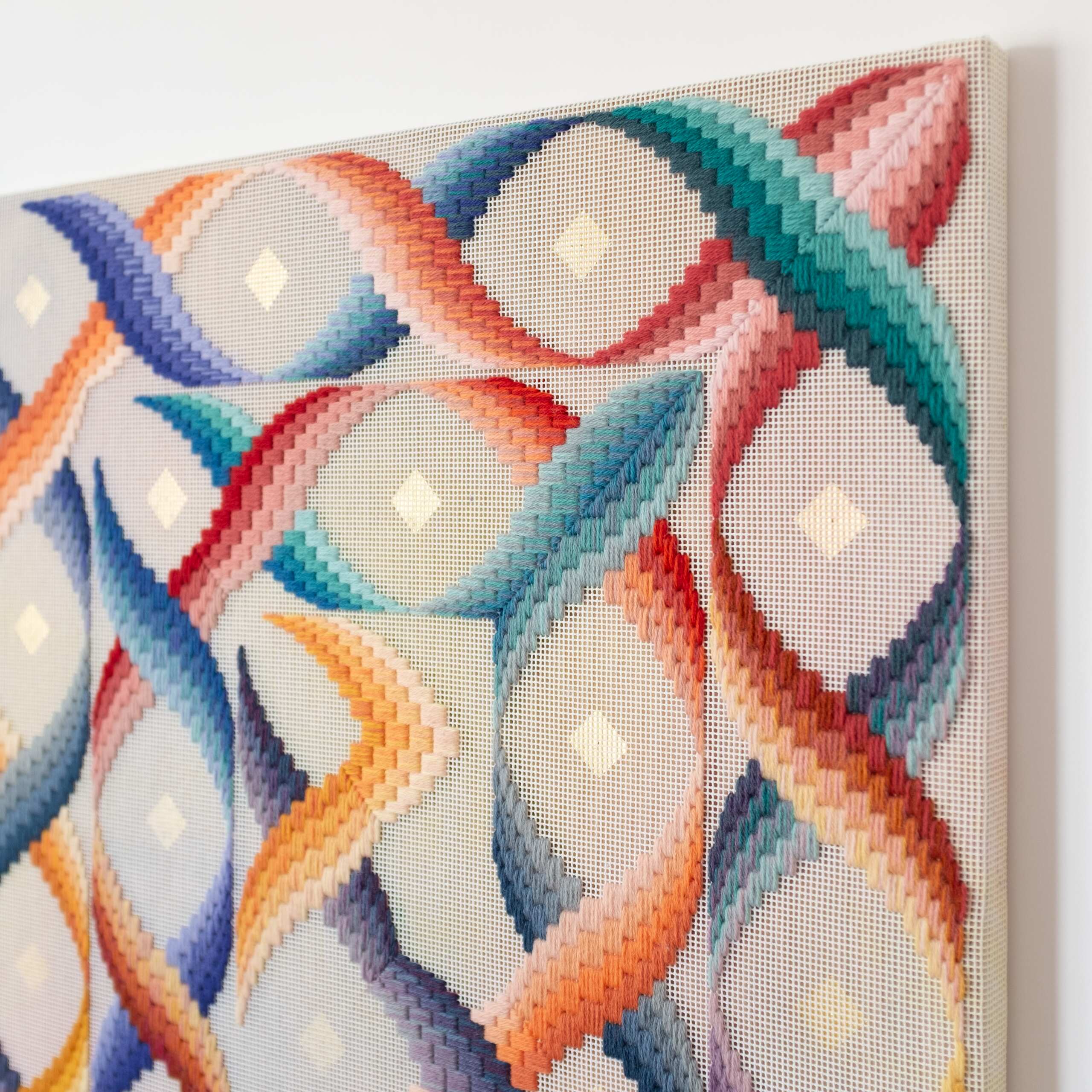 Dome of heaven [ouroboros], Hand-embroidered wool yarn on cotton canvas over cedar panel, 24-carat gold leaf, 2024