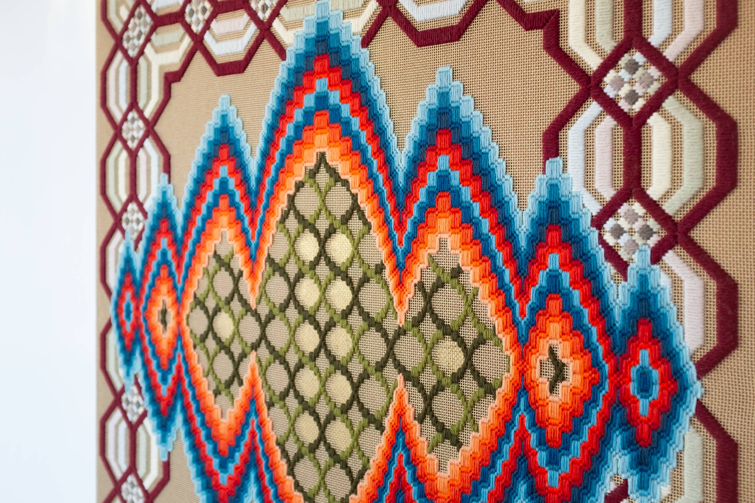 the two eternal poles of the world meet, multiply and converse [blue-red psychic portal], Hand-embroidered wool yarn on cotton canvas over cedar panel, 24-carat gold leaf, 2024